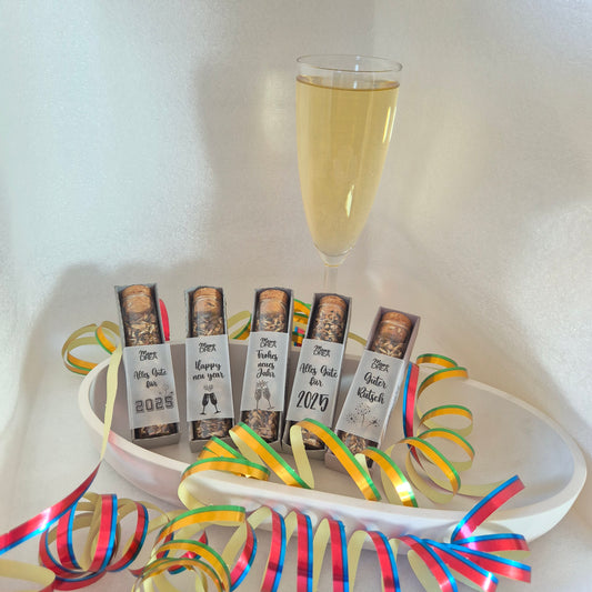 Glasröhrchen gefüllt mit Wildblumensamen, in Papphülle mit Transparent-Banderole und Grußtext //  10cm hoch